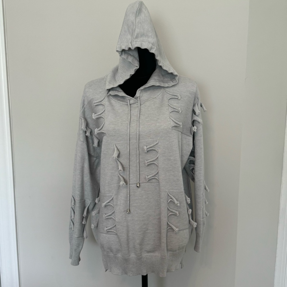 by JJ Gray Women’s Hooded Sweatshirt with Tagged detailing. Size S/M